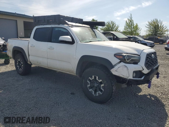 2022 Toyota Tacoma SR with VIN 3TYCZ5AN7NT056035, listed as a Copart auction lot 55510145 with 42,897 mi miles and Salvage title. Bid and sale history available at DreamBid. Image 4.