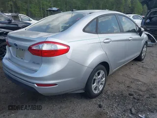 2014 Ford Fiesta SE with VIN 3FADP4BJXEM153408, listed as a IAAI auction lot 41972477 with 197,334 mi miles. Bid and sale history available at carsss.com. Image 4.