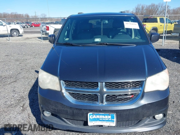 2014 Dodge Grand Caravan SXT with VIN 2C4RDGCG3ER339491, listed as a IAAI auction lot 41744826 with 146,757 mi miles and . Bid and sale history available at DreamBid. Image 12.