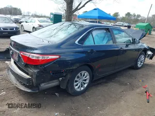 2017 Toyota Camry XLE with VIN 4T1BF1FK7HU687225, listed as a IAAI auction lot 42006107 with 4,807 mi miles. Bid and sale history available at carsss.com. Image 4.