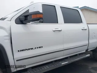 2015 GMC Sierra 2500HD Denali with VIN 1GT120E85FF681680, listed as a IAAI auction lot 42081711 with 67,676 mi miles and . Bid and sale history available at DreamBid. Image 14.