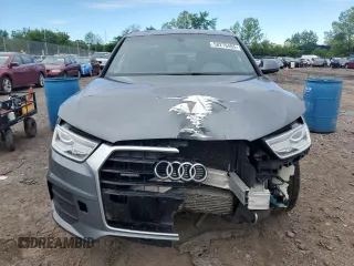 2017 Audi Q3 Premium z VIN WA1ECCFS5HR001606, wystawiony jako Copart lot #58276485 z przebiegiem 93 037 mil mil oraz Tytuł czysty. Historia ofert i sprzedaży dostępna na DreamBid. Obrazek 5.