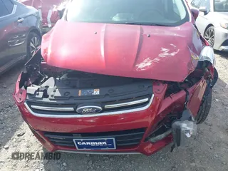 2016 Ford Escape Titanium with VIN 1FMCU0J93GUB11073, listed as a IAAI auction lot 41751349 with 92,000 mi miles. Bid and sale history available at carsss.com. Image 6.