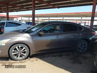 2015 Nissan Altima SL z VIN 1N4AL3AP0FC233740, wystawiony jako IAAI lot #42239684 z przebiegiem 111 970 mil mil oraz . Historia ofert i sprzedaży dostępna na DreamBid. Obrazek 14.