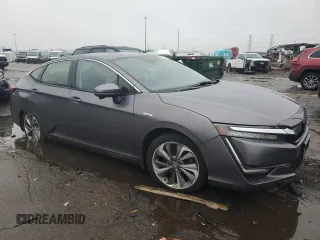 2018 Honda Clarity Plug-In Hybrid with VIN JHMZC5F17JC022801, listed as a Copart auction lot 84013154 with 106,590 mi miles and Clean Title. Bid and sale history available at carsss.com. Image 4.