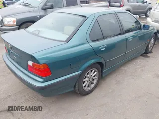 1998 BMW 3 Series 318iA with VIN WBACC0320WEK26338, listed as a IAAI auction lot 41187823 with 145,250 mi miles. Bid and sale history available at carsss.com. Image 4.