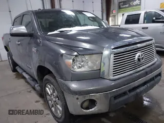 2012 Toyota Tundra 4WD Truck LTD with VIN 5TFHW5F14CX267765, listed as a IAAI auction lot 41345269 with 221,400 mi miles. Bid and sale history available at carsss.com. Image 1.