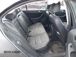 2014 Volkswagen Jetta SE z VIN 3VWD17AJ9EM358777, wystawiony jako IAAI lot #41880077 z przebiegiem 161 985 mil mil oraz . Historia ofert i sprzedaży dostępna na DreamBid. Obrazek 8.