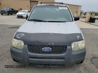 2003 Ford Escape XLS Popular with VIN 1FMYU02173KB43156, listed as a Copart auction lot 51534495 with 266,600 mi miles and Salvage title. Bid and sale history available at DreamBid. Image 5.