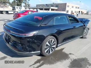 2024 Lucid Air Pure with VIN 50EA1PGA8RA003420, listed as a IAAI auction lot 41593215 with 3,856 mi miles. Bid and sale history available at carsss.com. Image 4.