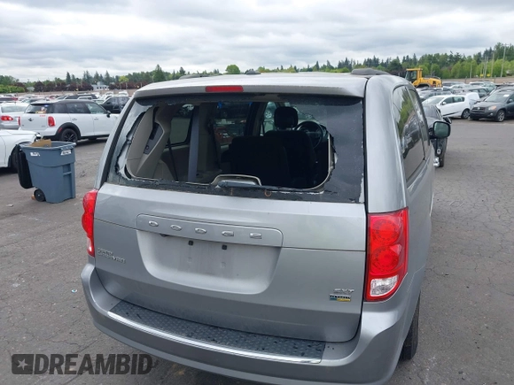 2016 Dodge Grand Caravan SXT with VIN 2C4RDGCG0GR177886, listed as a IAAI auction lot 42138184 with 151,696 mi miles. Bid and sale history available at carsss.com. Image 18.