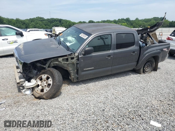 2010 Toyota Tacoma PreRunner with VIN 5TEJU4GN7AZ711911, listed as a Copart auction lot 60200385 with 209,579 mi miles and Salvage title. Bid and sale history available at DreamBid. Image 1.