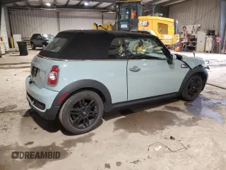 2014 MINI Convertible S с VIN WMWZP3C59ET707581, выставлен на аукционе Copart как лот 46983865 с пробегом 42 746 миль миль и Списание • Salvage title. История ставок и продаж доступна на DreamBid. Изображение 3.