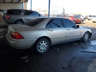 1999 Acura RL with VIN JH4KA9653XC006296, listed as a Copart auction lot 80290844 with 259,592 mi miles and Salvage Title. Bid and sale history available at carsss.com. Image 3.