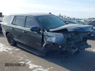 2021 Chevrolet Tahoe LT z VIN 1GNSKNKDXMR371904, wystawiony jako IAAI lot #41052926 z przebiegiem 89 009 mil mil oraz . Historia ofert i sprzedaży dostępna na DreamBid. Obrazek 1.