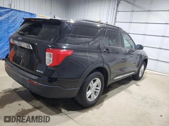 2022 Ford Explorer XLT z VIN 1FMSK8DH0NGB21901, wystawiony jako Copart lot #57749845 z przebiegiem 21 666 mil mil oraz Szkoda całkowita • Salvage title. Historia ofert i sprzedaży dostępna na DreamBid. Obrazek 3.