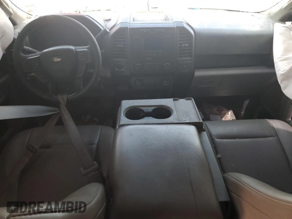 2020 Ford F-150 XL with VIN 1FTEW1CB4LKD41983, listed as a Copart auction lot 57474095 with 128,360 mi miles and Salvage title. Bid and sale history available at DreamBid. Image 8.