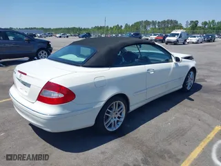 2009 Mercedes-Benz CLK-Class 3.5L with VIN WDBTK56F09T104434, listed as a IAAI auction lot 41976340 with 58,710 mi miles. Bid and sale history available at carsss.com. Image 4.
