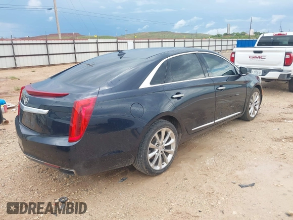 2013 Cadillac XTS Luxury with VIN 2G61P5S39D9182526, listed as a IAAI auction lot 42183995 with 132,778 mi miles. Bid and sale history available at carsss.com. Image 4.
