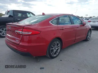 2020 Ford Fusion Hybrid Titanium with VIN 3FA6P0RU7LR156915, listed as a IAAI auction lot 40738652 with 82,836 mi miles. Bid and sale history available at carsss.com. Image 4.