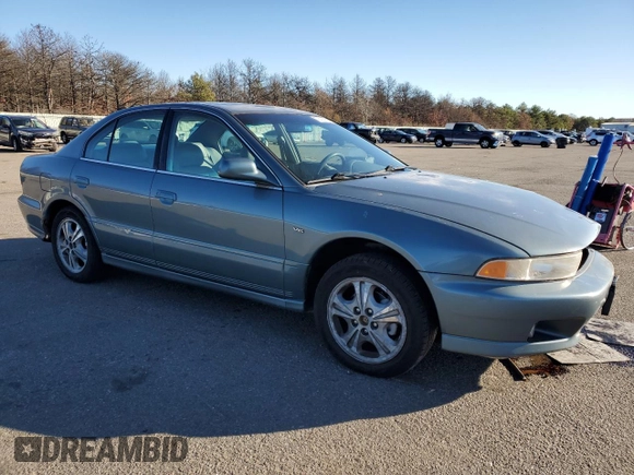 2000 Mitsubishi Galant LS with VIN 4A3AA56LXYE174881, listed as a Copart auction lot 79727154 with 106,001 mi miles and Salvage Title. Bid and sale history available at carsss.com. Image 4.