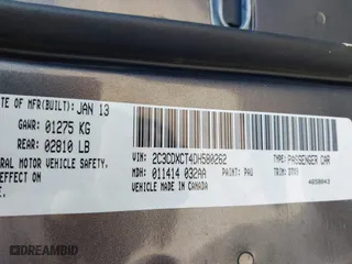 2013 Dodge Charger RT Max with VIN 2C3CDXCT4DH580262, listed as a IAAI auction lot 41252672 with 103,276 mi miles. Bid and sale history available at carsss.com. Image 9.
