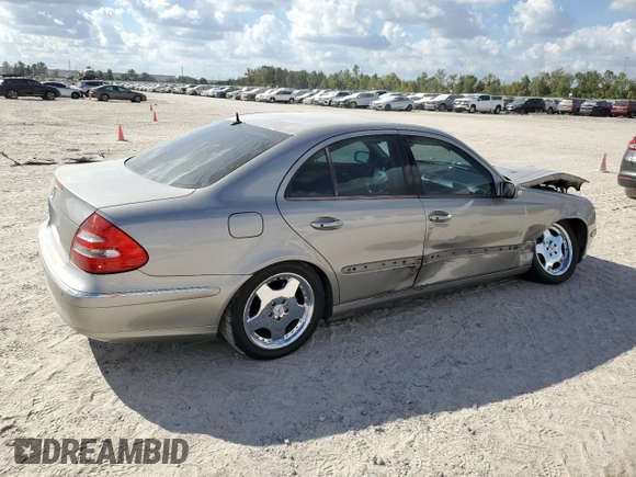 2003 Mercedes-Benz E-Class 5.0L with VIN WDBUF70J73A119596, listed as a Copart auction lot 77382424 with 237,620 mi miles and Salvage Title. Bid and sale history available at carsss.com. Image 3.