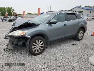 2010 Mazda CX-9 Grand Touring с VIN JM3TB3MA9A0235632, выставлен на аукционе Copart как лот 58573395 с пробегом 180 692 миль миль и Списание • Salvage title. История ставок и продаж доступна на DreamBid. Изображение 1.