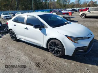 2021 Toyota Corolla SE with VIN 5YFS4MCE2MP076133, listed as a IAAI auction lot 40924622 with 95,730 mi miles. Bid and sale history available at carsss.com. Image 1.