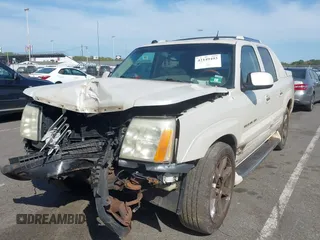 2004 Cadillac Escalade EXT z VIN 3GYEK62N34G304883, wystawiony jako IAAI lot #42149493 z przebiegiem 177 911 mil mil oraz . Historia ofert i sprzedaży dostępna na DreamBid. Obrazek 6.