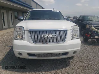 2007 GMC Yukon Denali z VIN 1GKFK63817J345216, wystawiony jako Copart lot #52853275 z przebiegiem 245 524 mil mil oraz Szkoda całkowita • Salvage title. Historia ofert i sprzedaży dostępna na DreamBid. Obrazek 5.
