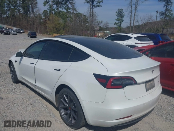 2022 Tesla Model 3 Long Range with VIN 5YJ3E1EB0NF106570, listed as a IAAI auction lot 41832622 with 52,679 mi miles and . Bid and sale history available at DreamBid. Image 3.