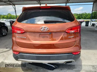 2014 Hyundai Santa Fe with VIN 5XYZT3LB4EG145430, listed as a Copart auction lot 58554075 with 38,690 mi miles and Salvage title. Bid and sale history available at DreamBid. Image 6.