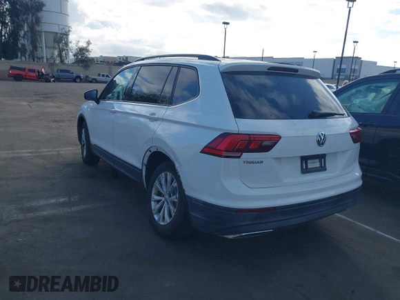 2019 Volkswagen Tiguan S with VIN 3VV1B7AX2KM039970, listed as a IAAI auction lot 41498706 with 56,907 mi miles and . Bid and sale history available at DreamBid. Image 3.