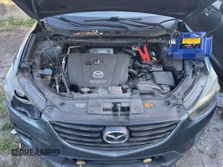 2016 Mazda CX-5 Grand Touring with VIN JM3KE4DY9G0673789, listed as a IAAI auction lot 42196841 with 98,622 mi miles and . Bid and sale history available at DreamBid. Image 10.