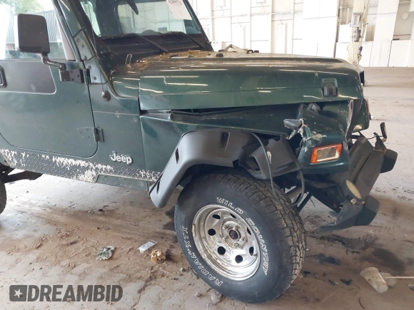 2000 Jeep Wrangler Sport with VIN 1J4FA49S8YP780104, listed as a IAAI auction lot 42095731 with Not provided miles and . Bid and sale history available at DreamBid. Image 16.