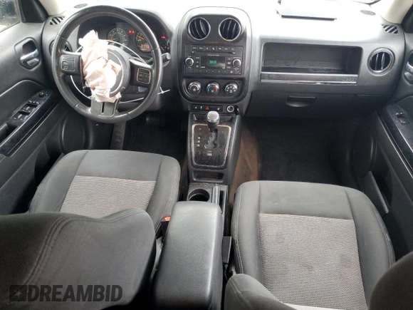 2014 Jeep Patriot Latitude with VIN 1C4NJPFA1ED651021, listed as a Copart auction lot 56947445 with 137,239 mi miles and Salvage title. Bid and sale history available at DreamBid. Image 8.