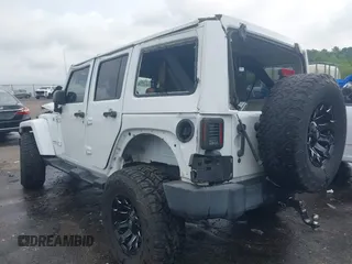 2016 Jeep Wrangler Unlimited Rubicon Hard Rock with VIN 1C4BJWFG3GL228449, listed as a IAAI auction lot 42158318 with Not provided miles and . Bid and sale history available at DreamBid. Image 3.