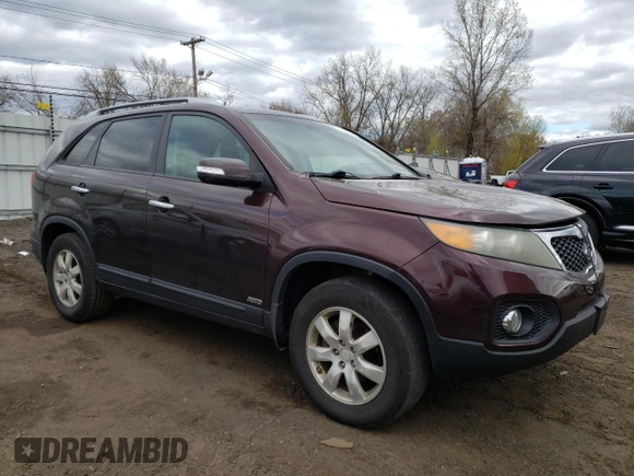 2011 Kia Sorento LX with VIN 5XYKTCA13BG055192, listed as a Copart auction lot 52969655 with 263,011 mi miles and Salvage Title. Bid and sale history available at DreamBid. Image 4.