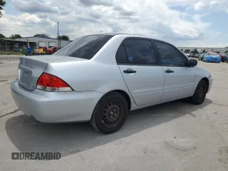 2006 Mitsubishi Lancer with VIN JA3AJ16E56U005818, listed as a Copart auction lot 60749615 with 155,194 mi miles and Salvage title. Bid and sale history available at DreamBid. Image 3.
