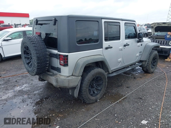 2007 Jeep Wrangler Unlimited X with VIN 1J4GA39187L209448, listed as a IAAI auction lot 42104328 with 138,302 mi miles and . Bid and sale history available at DreamBid. Image 4.