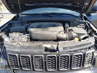 2020 Jeep Grand Cherokee Limited with VIN 1C4RJFBG6LC434475, listed as a IAAI auction lot 41810424 with 116,959 mi miles and . Bid and sale history available at DreamBid. Image 10.