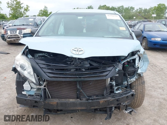 2016 Toyota Sienna L with VIN 5TDZK3DC5GS710011, listed as a IAAI auction lot 42358731 with 119,104 mi miles and . Bid and sale history available at DreamBid. Image 6.