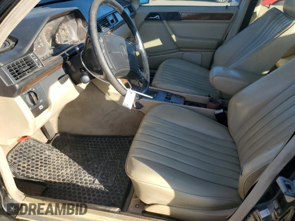 1990 Mercedes-Benz 300 with VIN WDBEB28D9LB211854, listed as a Copart auction lot 49795515 with 241,074 mi miles and Salvage Title. Bid and sale history available at DreamBid. Image 7.