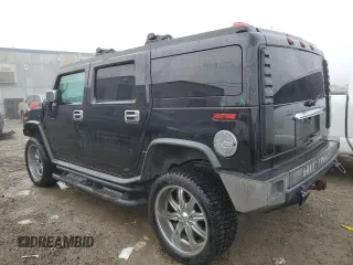 2003 Hummer H2 with VIN 5GRGN23U83H143843, listed as a Copart auction lot 43792915 with 115,569 mi miles and Salvage Title. Bid and sale history available at carsss.com. Image 2.