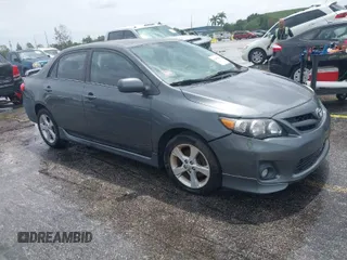 2012 Toyota Corolla L with VIN 2T1BU4EE0CC899994, listed as a IAAI auction lot 42005306 with 115,257 mi miles. Bid and sale history available at carsss.com. Image 1.