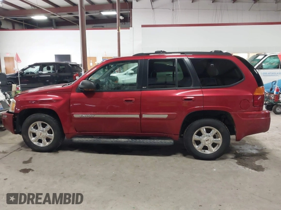 2003 GMC Envoy SLT with VIN 1GKDT13SX32134944, listed as a IAAI auction lot 41498519 with 149,640 mi miles. Bid and sale history available at carsss.com. Image 14.