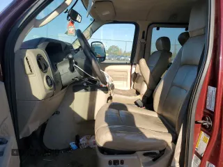 2010 Ford Econoline Passenger XL with VIN 1FMNE1BW6ADA87472, listed as a Copart auction lot 74989314 with 215,315 mi miles and Salvage Title. Bid and sale history available at DreamBid. Image 7.