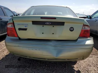 2007 Ford Focus S with VIN 1FAFP34N57W138756, listed as a Copart auction lot 54402375 with 260,127 mi miles and Salvage title. Bid and sale history available at DreamBid. Image 6.