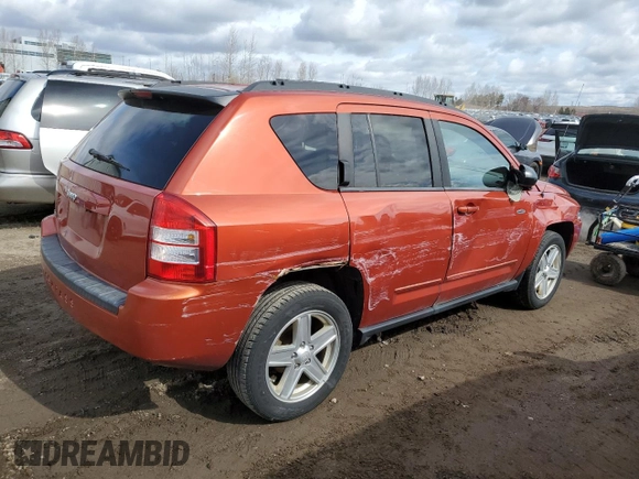 2010 Jeep Compass North Edition with VIN 1J4NF4FB0AD630982, listed as a Copart auction lot 50602465 with 233,513 mi miles and Clean Title. Bid and sale history available at carsss.com. Image 3.